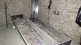 Lochy zamkowe- kości wieźniów złożone w grobach